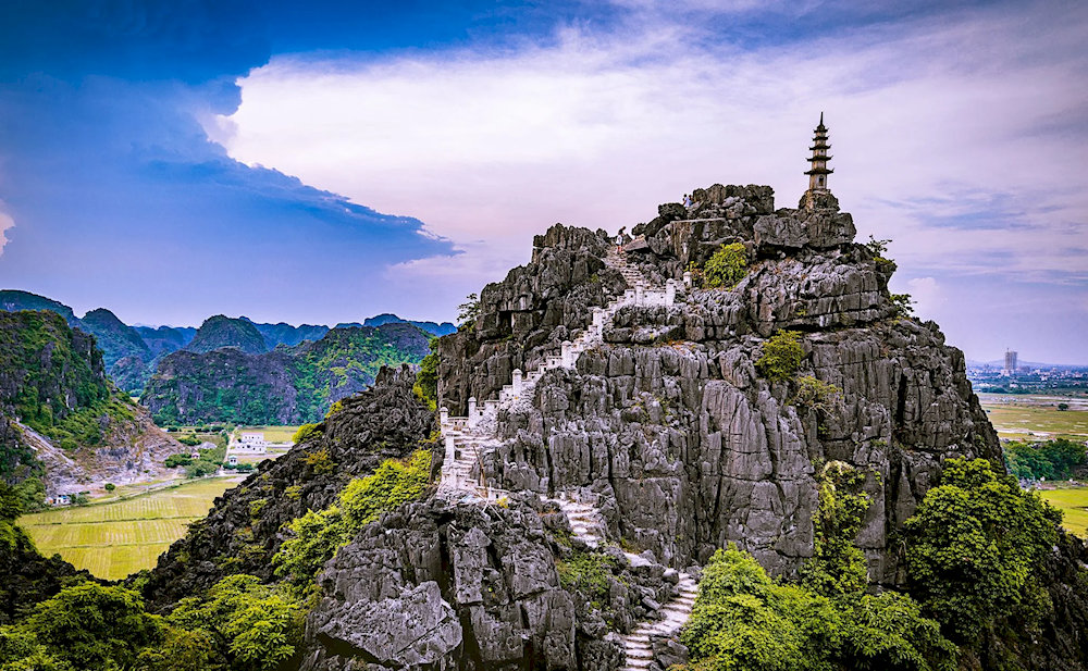 Mua Caves is a breathtaking viewpoint in Ninh Binh, known for its 500-step stone staircase leading to panoramic views
